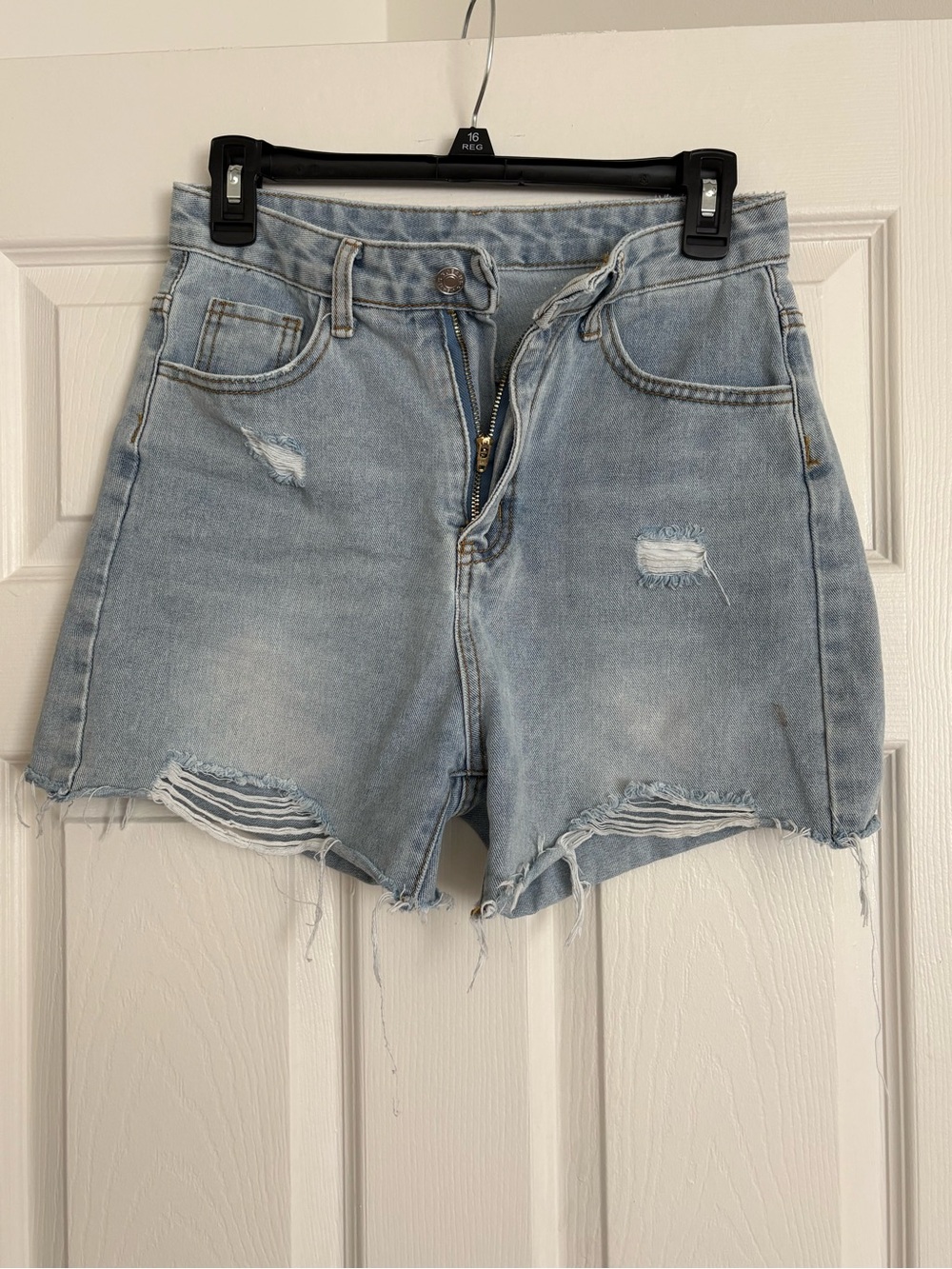 High-Rise Light Blue Distressed Denim Shorts